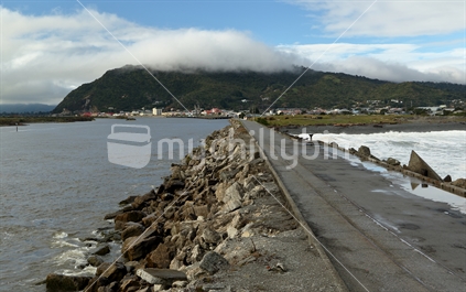 Looking back along the breakwater towards Greymouth from the mouth of the Grey River