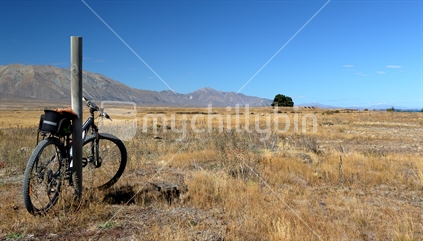 One bike rests against a post near Tekapo
