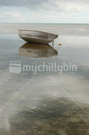 A boat anchored in the water