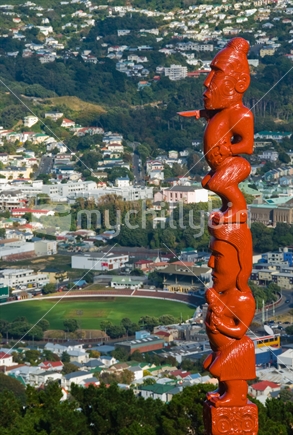 Maori Pou overlooking Wellington suburbs, New Zealand