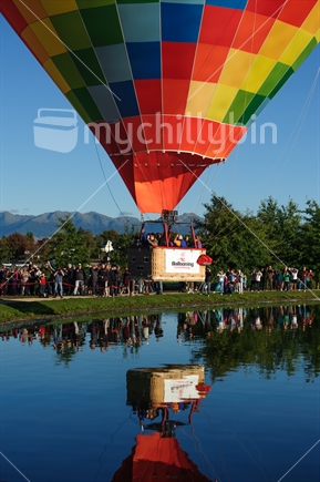 balloon low over a lake