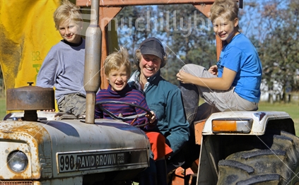 Family on a tractor