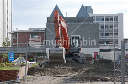 A large machine being used to clear a site following the 2011 Christchurch Earthquake,

