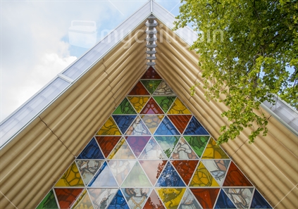 the Transitional Cardboard Cathedral in Christchurch in Latimer square showing the stainglass window in the front