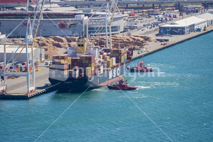 Two tugs assist an MSC container ship at the wellington waterside at the Thorndon Container Terminal