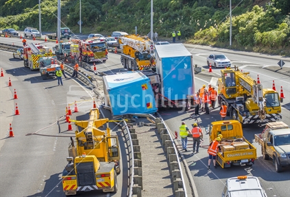 Rescue Workers and clean up crews attend the scene of an accident on SH1 near WEllington where a truck jacknifed and hindered traffic movement