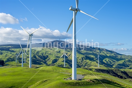 Images of wind turbines comprising some of the mills in the Te Apiti wind farm in the Tararua hills near Ashurst and Palmerston North. In this shot 7 turbines can be seen from the public viewing area when looking north.
