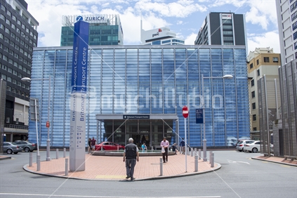 Auckland, New Zealand, December 12 2015. the entrance to the Britomart centre showing direction signs, fountain, pond and facade