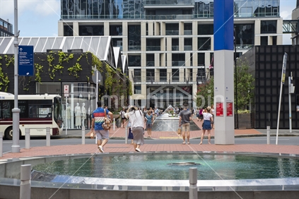 Auckland, New Zealand, December 12 2015. As you exit  the entrance to the britomart centre you see the pond and shops across the road