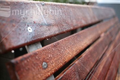 Wooden slats of a park bench