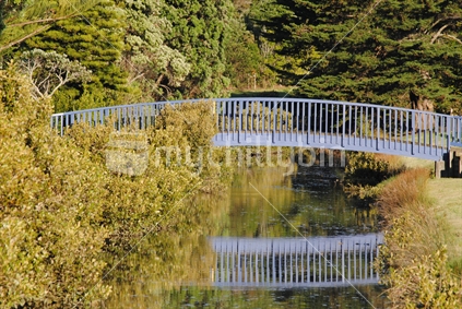 Bridge and reflection over creek