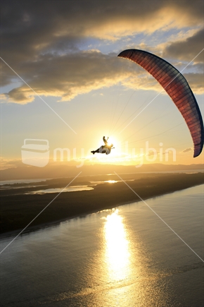 Paraglider against a sunset backdrop from Mount Maunganui, Tauranga