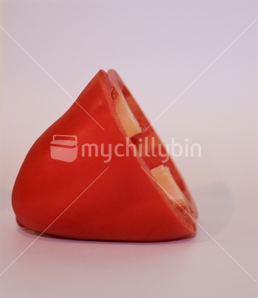 Red pepper capsicum end cut off on white background (limited depth of field).