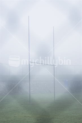 Rugby goalpost on a foggy winter morning, New Zealand