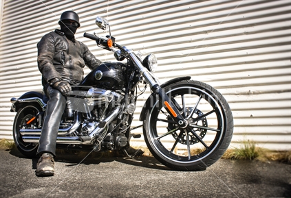 Man riding Harley Davidson. 