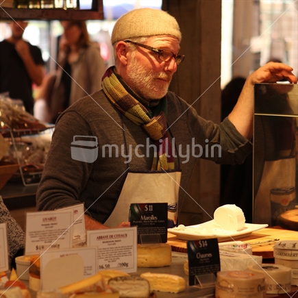 Parnell Market cheese sales man at work