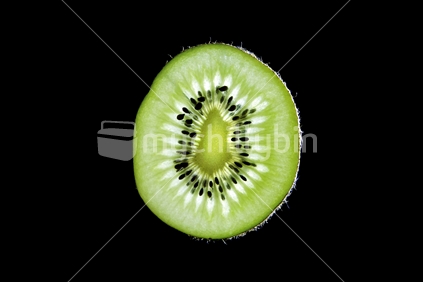 Cross section kiwi fruit with black background (see also mychillybin#102325_208)