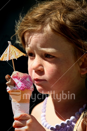 Young girl holding an ice cream 