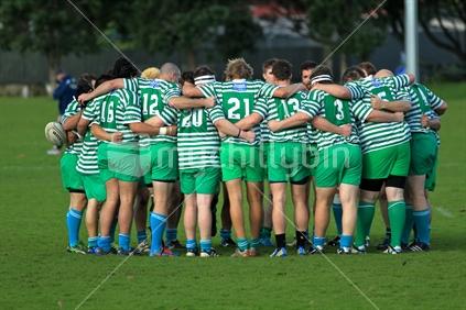 Rugby - the national sport: the huddle to discuss the game plan