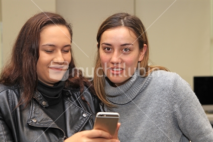 Two Maori female university student in learning lab