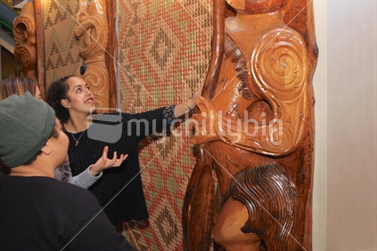 A group of Maori university students - background cultural design