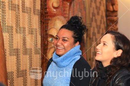 A group of Maori university students - background cultural design