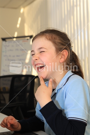 School student laughing