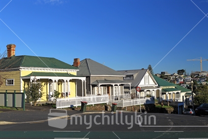 Housing 1 - a row of Auckland Victorian villas in morning light