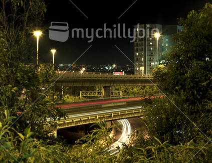 Auckland city at night; three levels of spaghetti junction. 