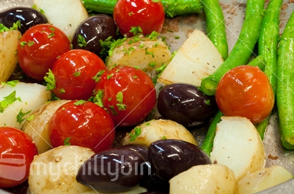 Vegetable medley, fresh vibrant colours, includes beans, black olives etc.