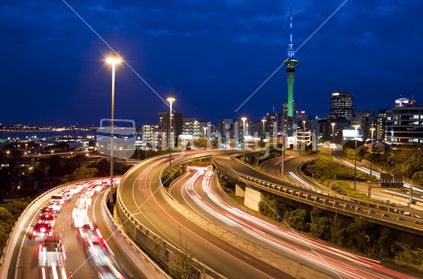 Auckland Spaghetti Junction Motorway, and Skytower, at dusk.