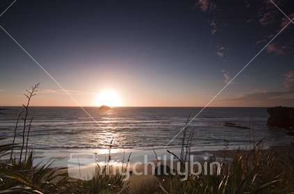 Sunset at Muriwai Beach, West Coast