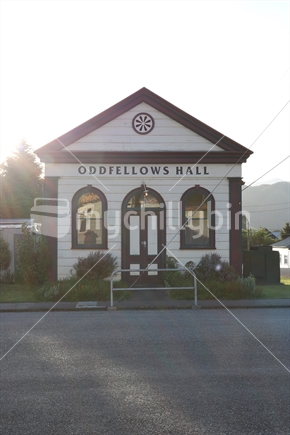 Oddfellows Hall, Reefton (includes person reflection in window, and stay wire)