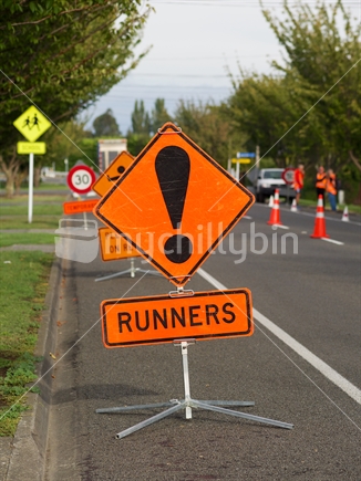 Sign to warn motorists of a road running event