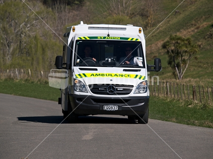 An ambulance on a rural road