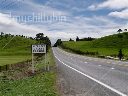 A passing lane on a main highway, with keep left sign.  (Highway 5 from Taupo to Rotorua at Tumunui).