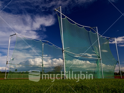 A protection net/cage around a discus/shot put circle