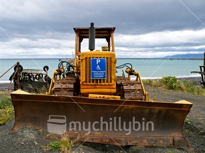 An old bulldozer used to tow a commercial fishing boat at Ngawi, Wairarapa