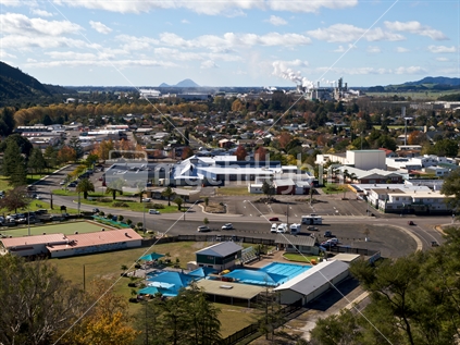 A view of Kawerau township, pool complex, industry, and Moutohora Island in the distance.