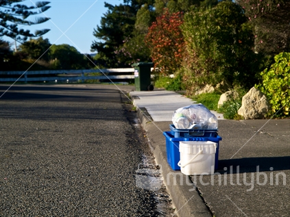 Items for recycling put out for collection on a suburban street