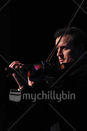 Violinist performing in live New Zealand concert