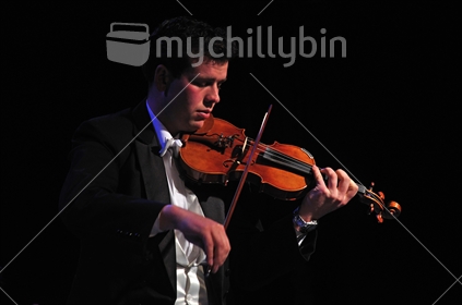 Violinists performing with eyes closed in live New Zealand concert