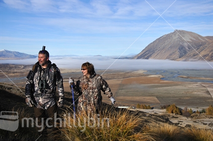 Hunters survey the high country of New Zealand