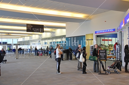 Queue of passengers waiting to depart from Queenstown Airport, South Island