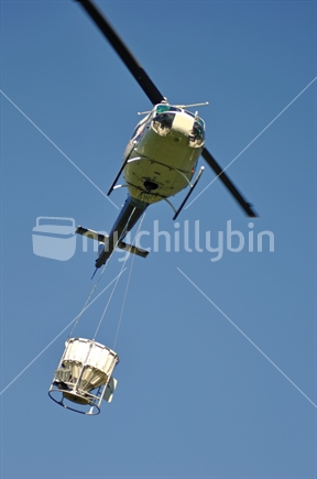 Iraquios helicopter carrying a monsoon bucket loaded with 1080 poison.