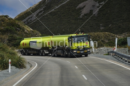 Bulk oil tanker on bend in road at Arthurs Pass