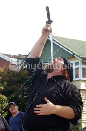 Busker swallows a sword, Christchurch