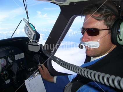 Pilot uses GPS for checking position on ferry aircraft delivery flight to New Zealand - over Pacific Ocean with a Dornier 228