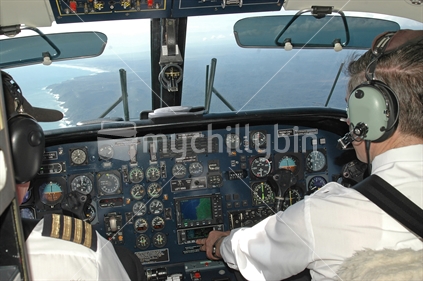 Pilots and aircraft cockpit in Dornier 228