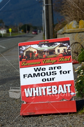 Signage in Karamea points the way to fresh whitebait